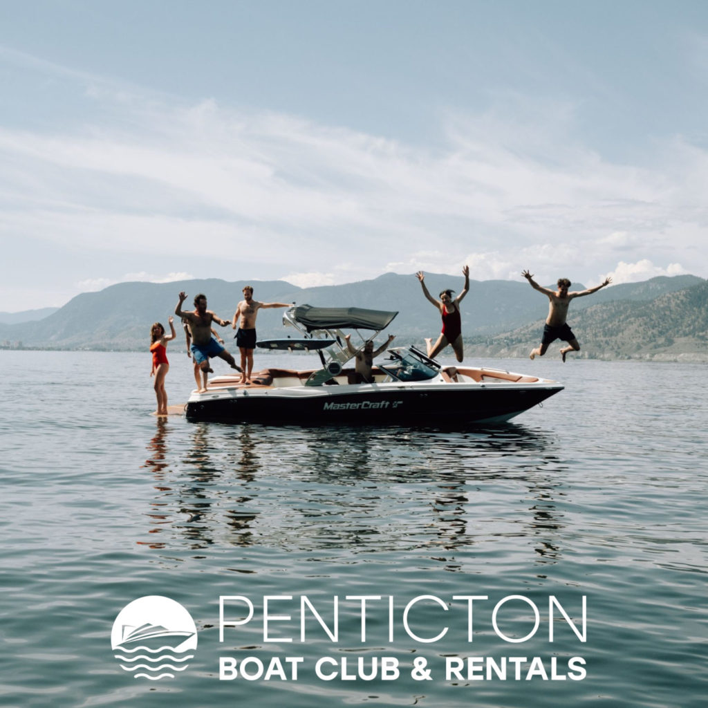 People jumping off boat rented from Penticton Boat Club and Rentals